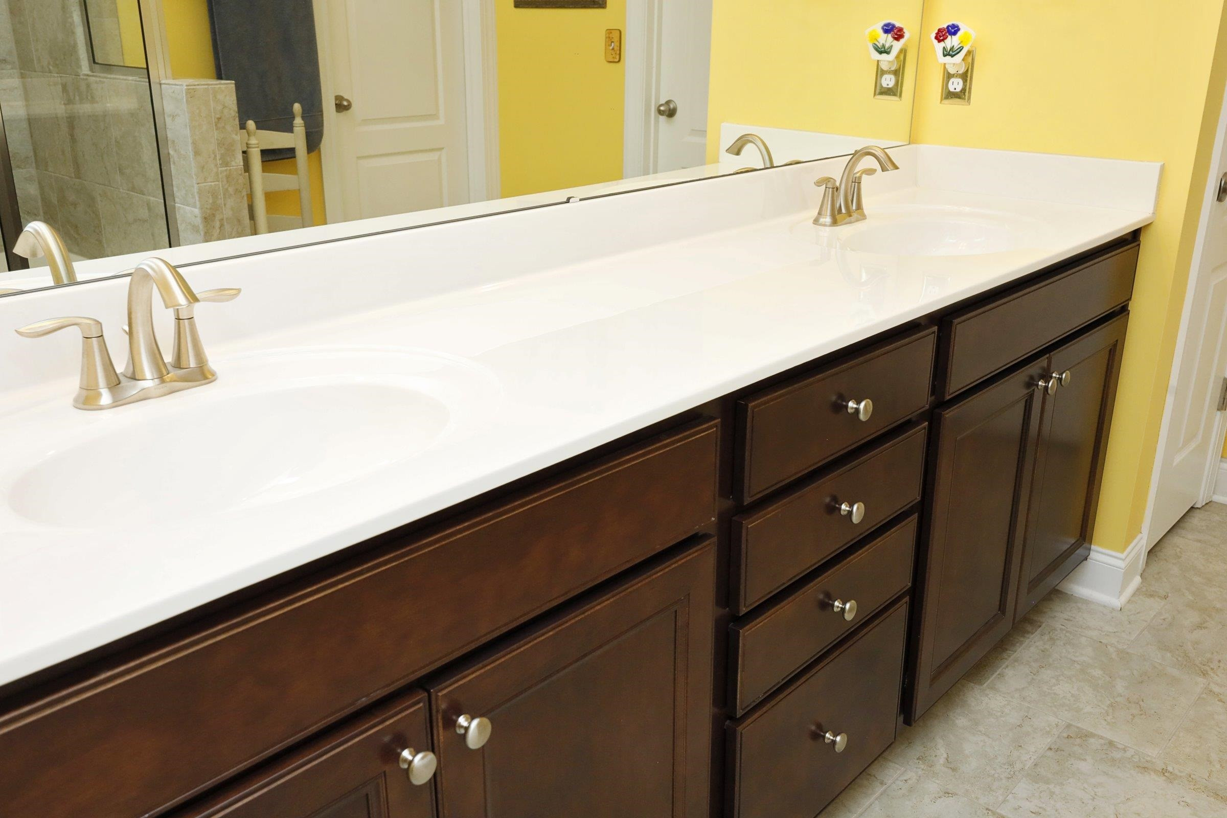 1241 Catch Fly Lane Durham, NC 27713 - Photo 30 of 44 a bathroom with a sink and a mirror