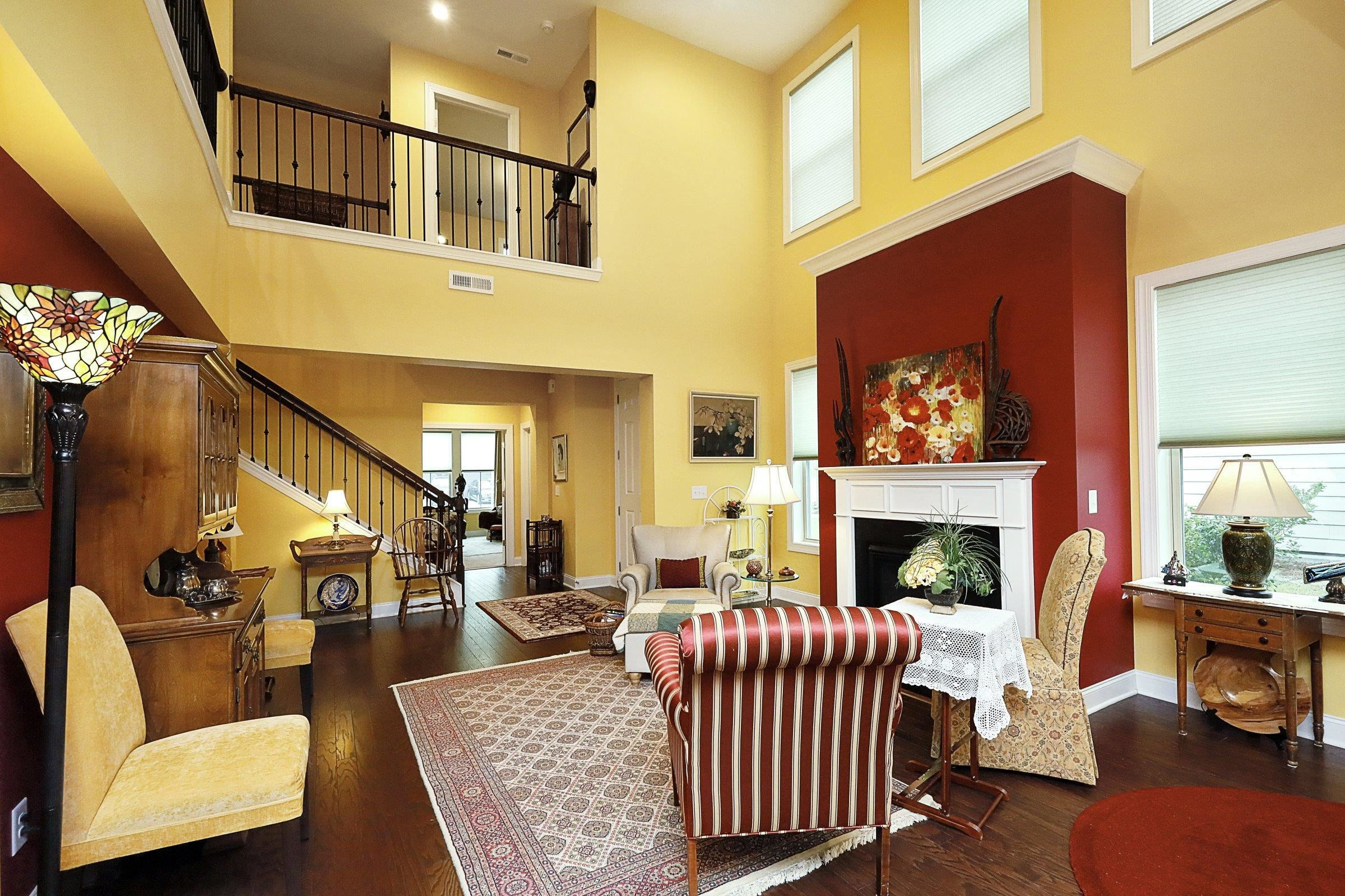1241 Catch Fly Lane Durham, NC 27713 - Photo 3 of 44 a living room with furniture and a fireplace
