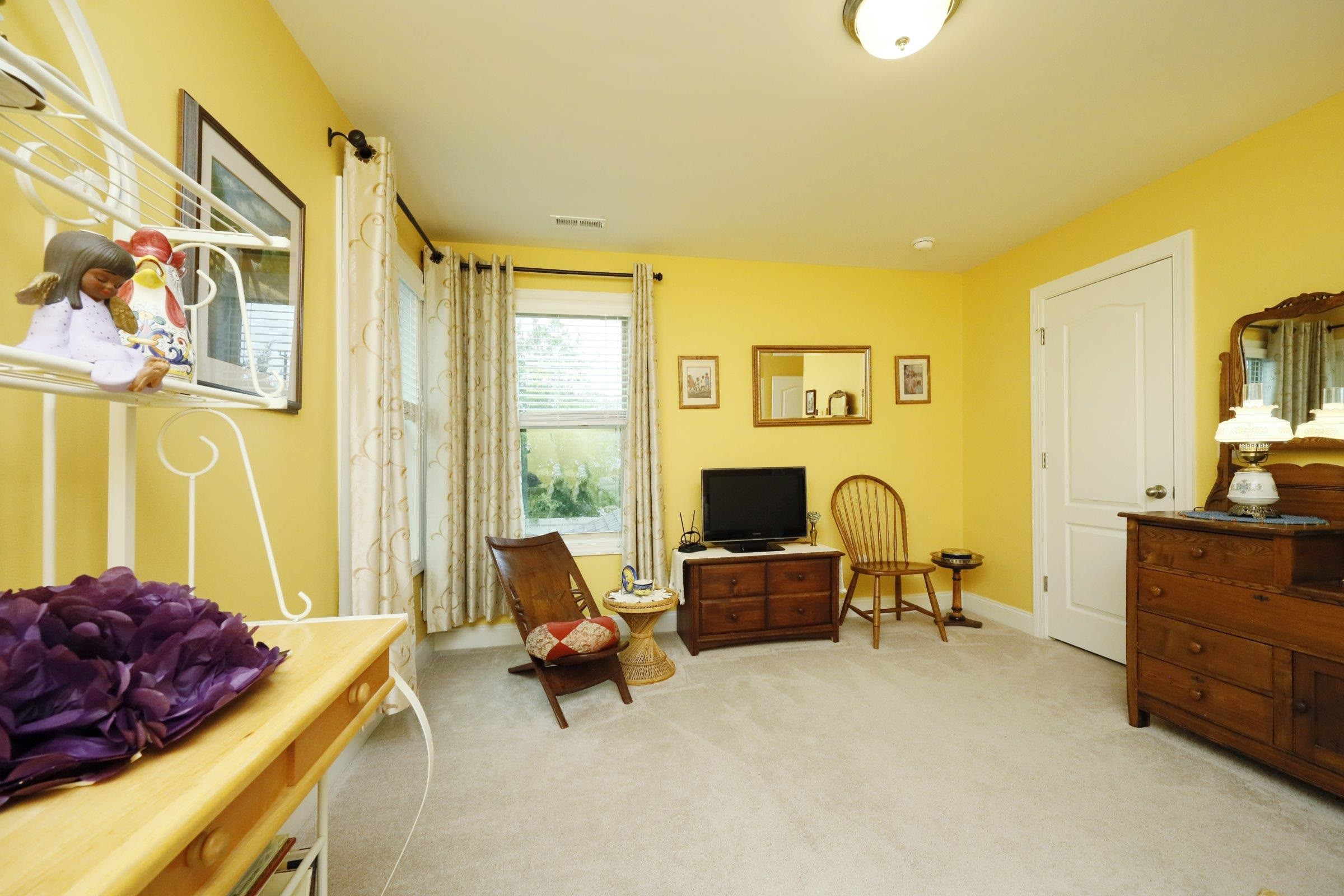 1241 Catch Fly Lane Durham, NC 27713 - Photo 32 of 44 a living room with furniture and a flat screen tv