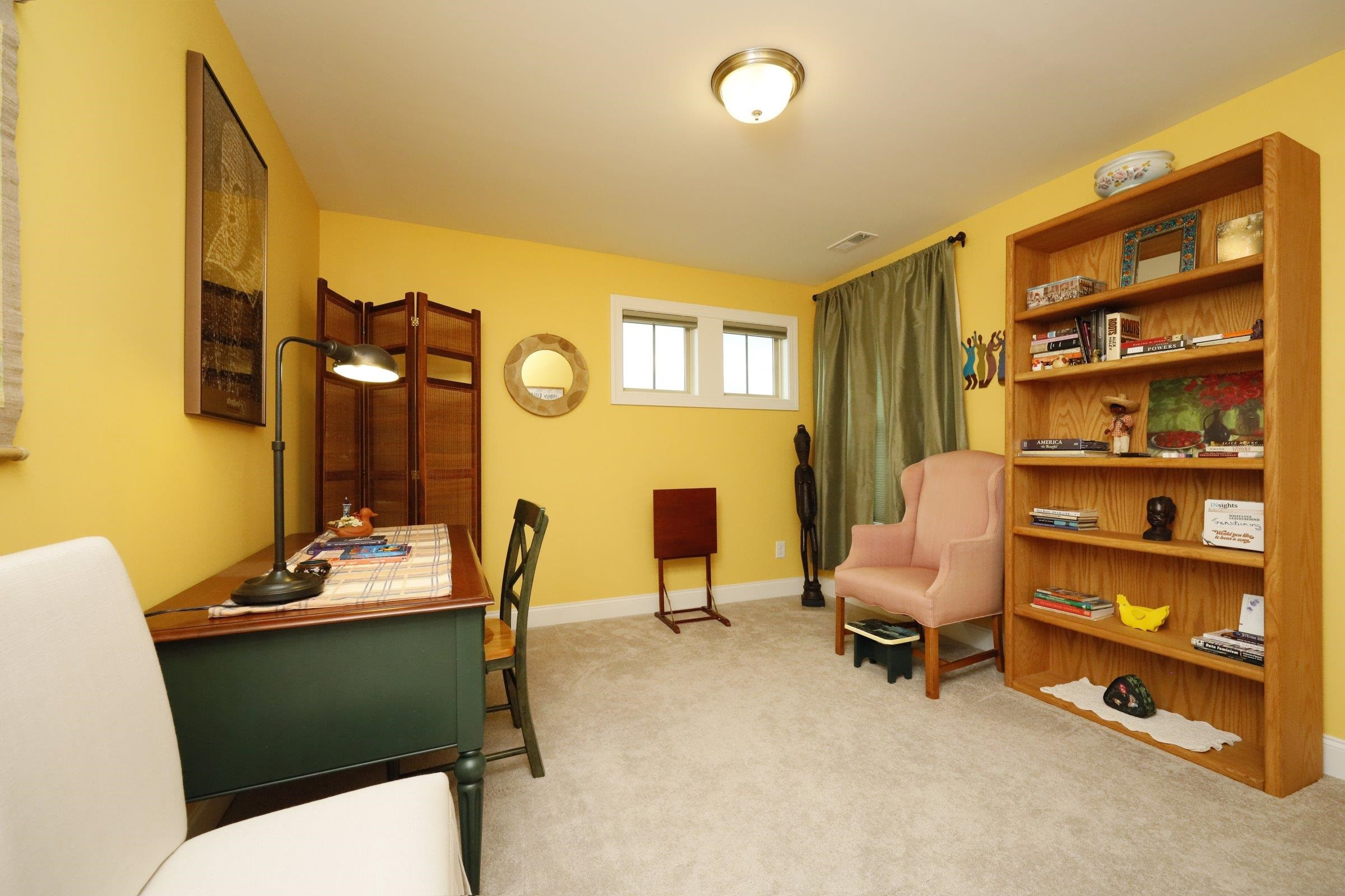 1241 Catch Fly Lane Durham, NC 27713 - Photo 33 of 44 a room with furniture and gym equipment