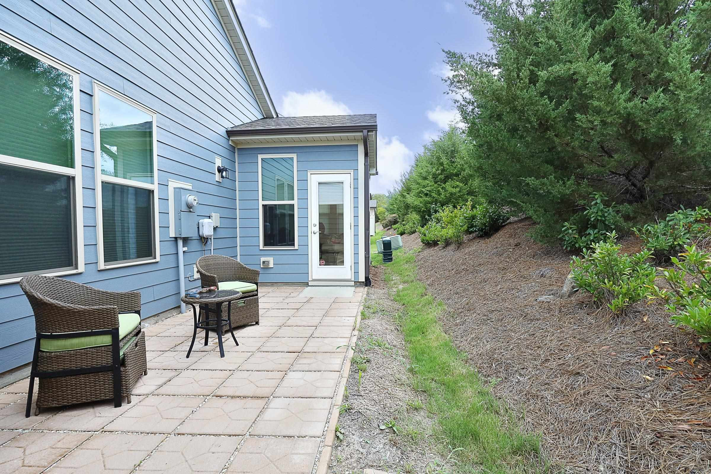 1241 Catch Fly Lane Durham, NC 27713 - Photo 36 of 44 a backyard of a house with outdoor seating