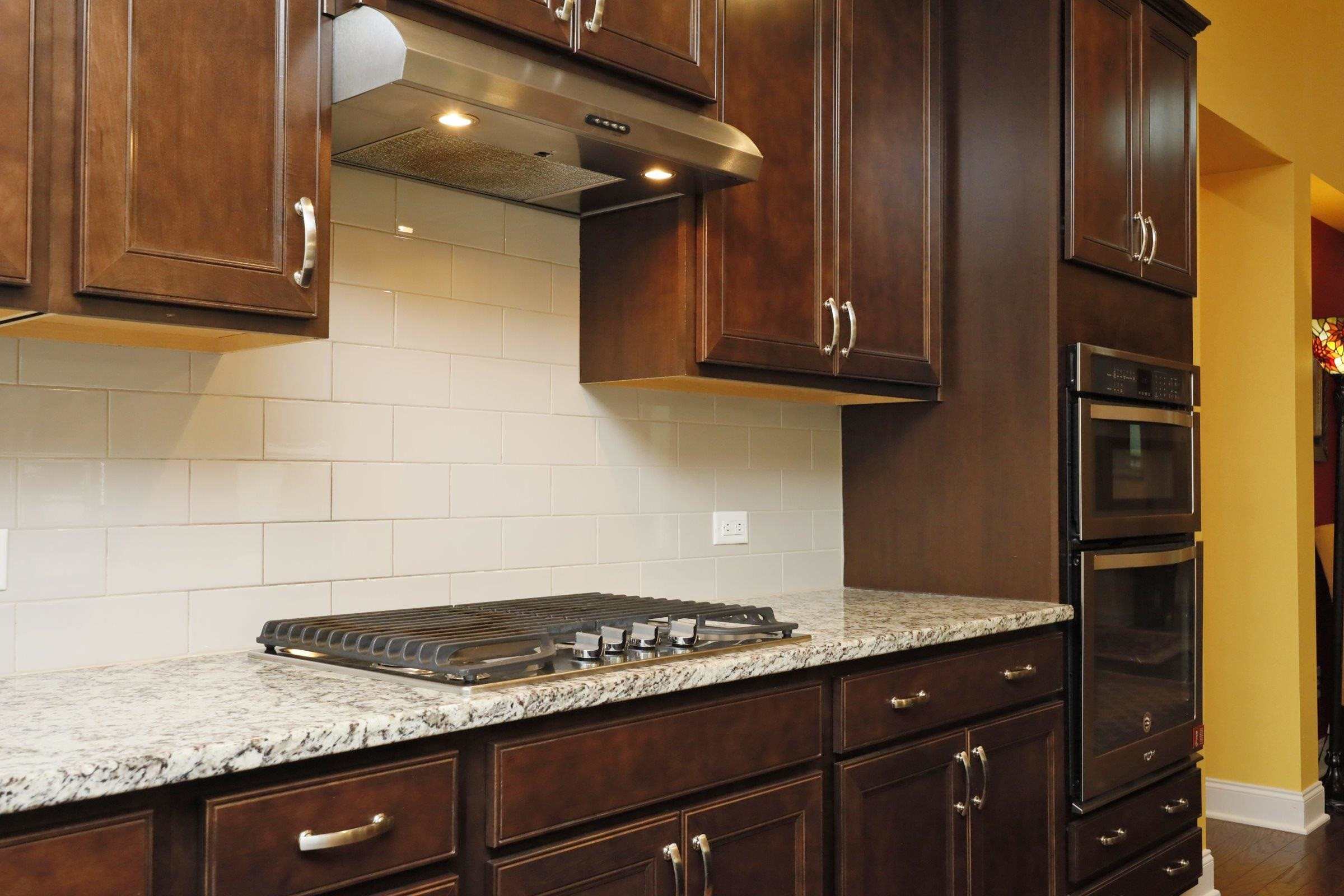 1241 Catch Fly Lane Durham, NC 27713 - Photo 9 of 44 a view of a kitchen counter space and wooden floor