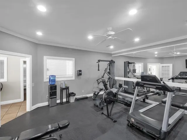 a view of a room with gym equipment
