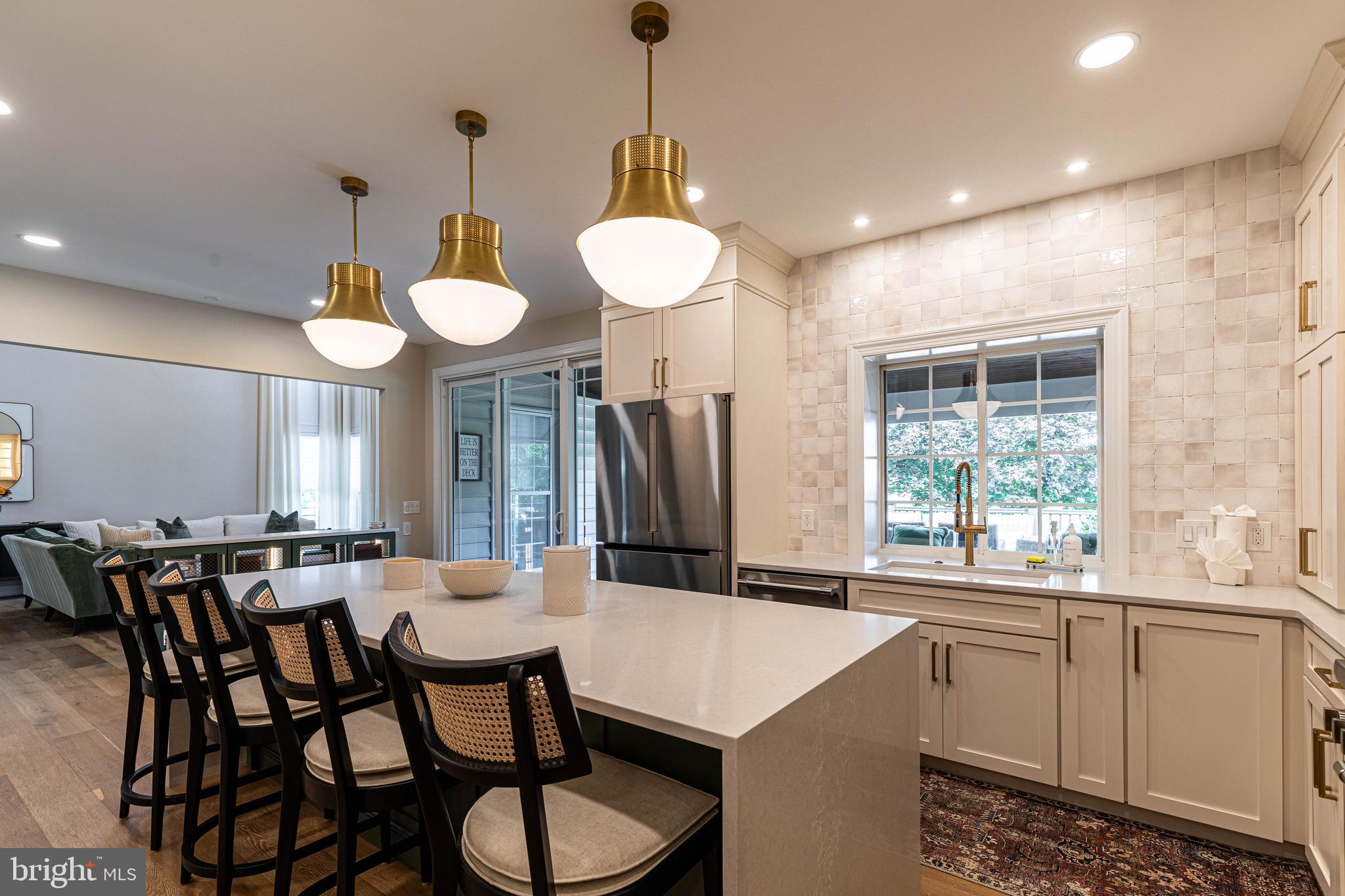 6 Inverness Drive Medford, NJ 08055 - Photo 18 of 62 a kitchen with a table and chairs in it