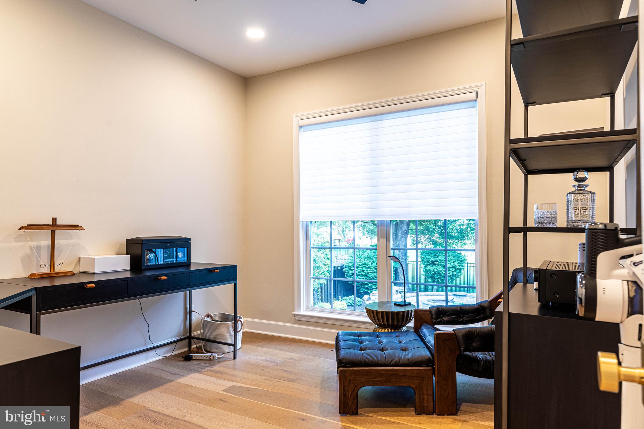 6 Inverness Drive Medford, NJ 08055 - Photo 31 of 62 a living room with furniture a flat screen tv and a window