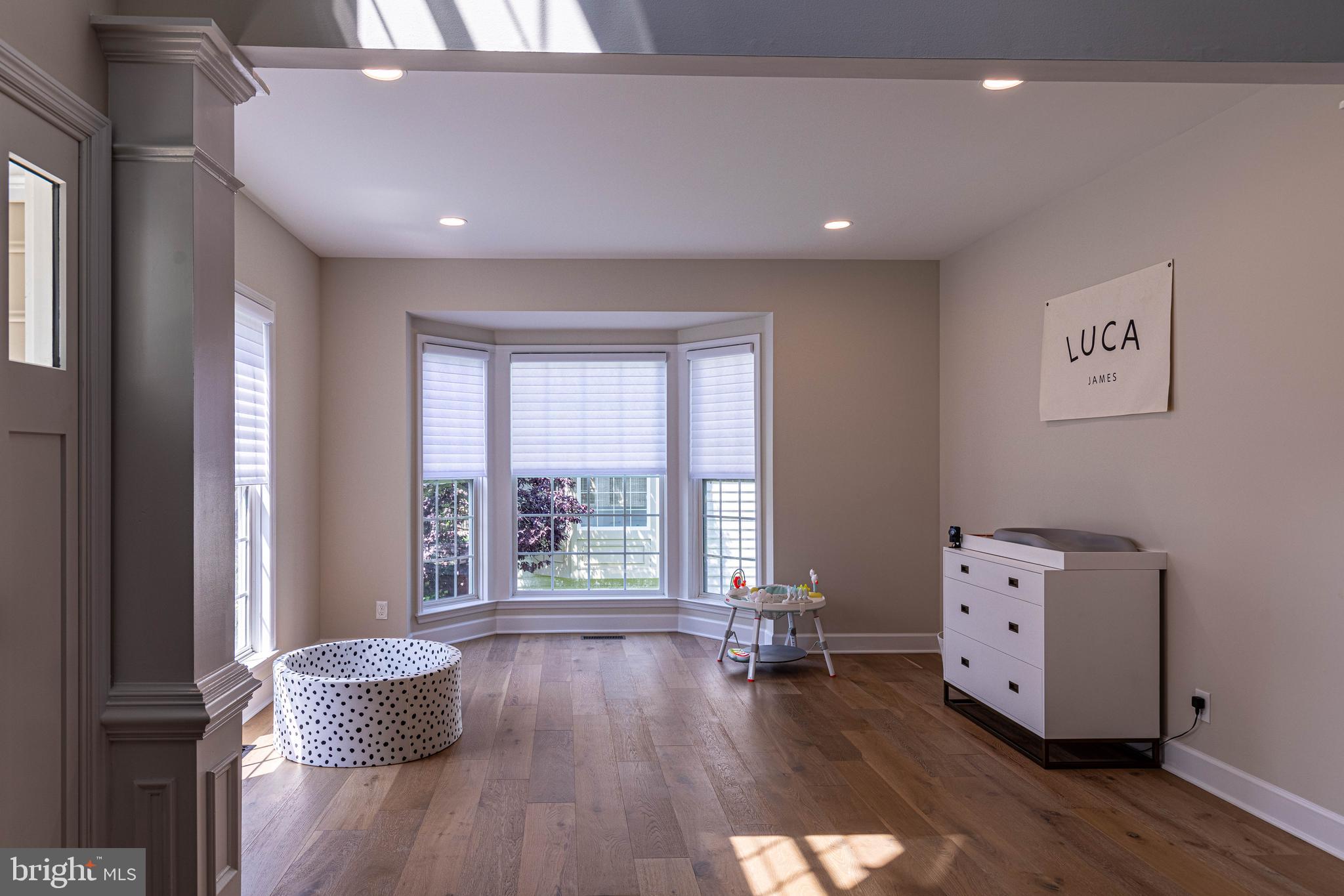 6 Inverness Drive Medford, NJ 08055 - Photo 10 of 62 a living room with hard wood floors and a window
