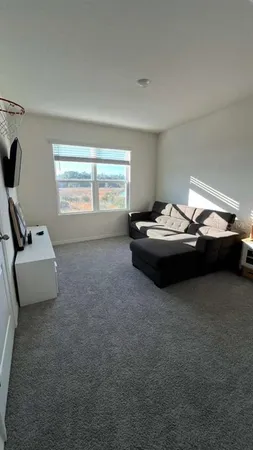 a car parked in a room next to a window