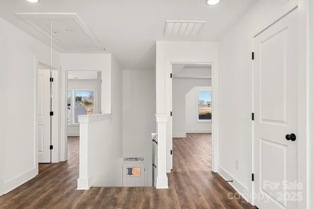 wooden floor in a white room