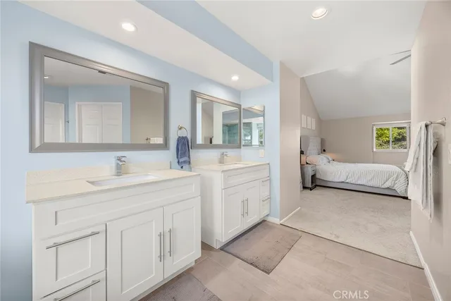 a view of a swimming pool with a lounge chairs