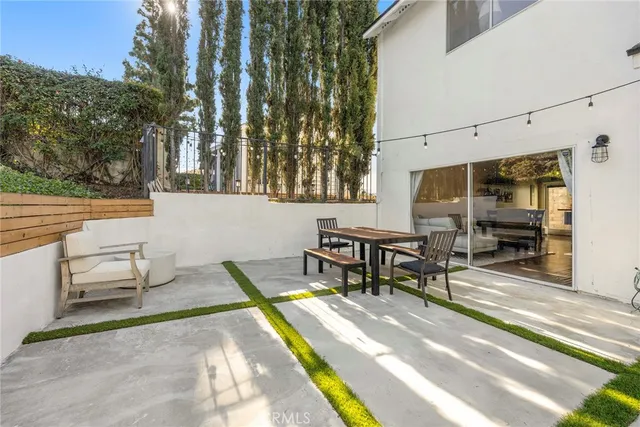 a view of a terrace with sitting area