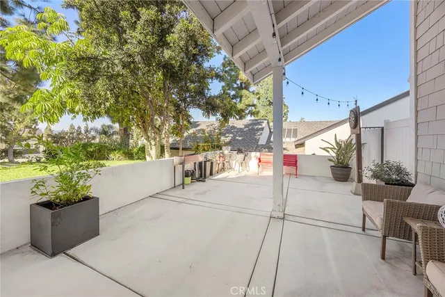 a outdoor space with lots of potted plants