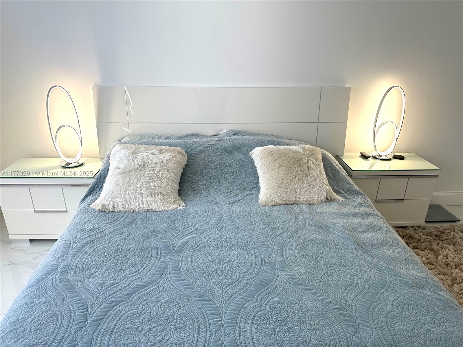 427 Golden Isles Drive, Unit 5G Hallandale Beach, FL 33009 - Photo 15 of 35 a living room with a couch