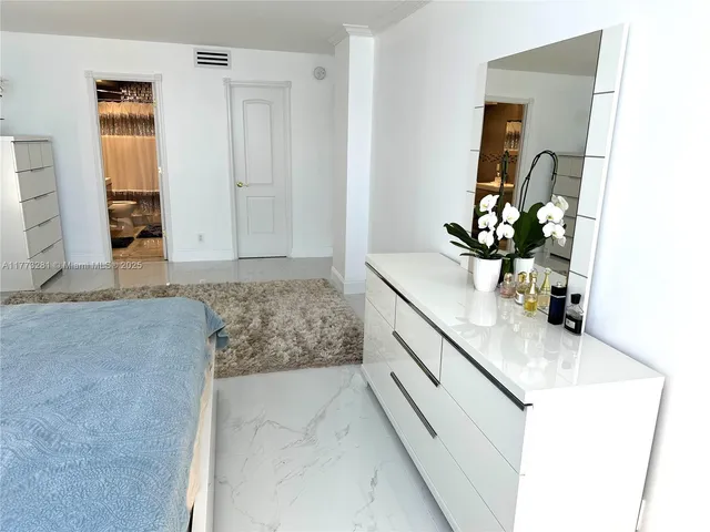 a bathroom with sink bathtub and mirror