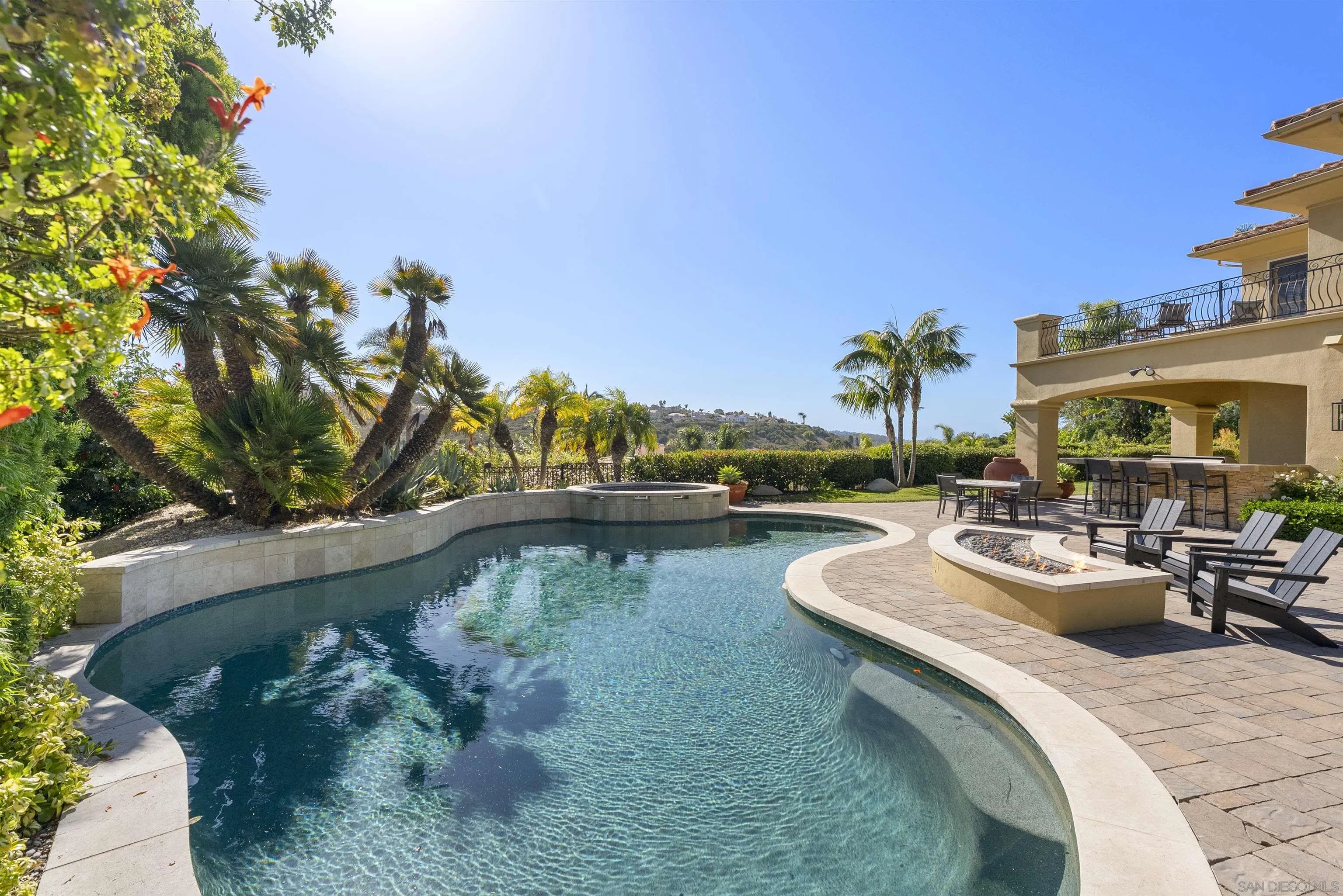 14480 Bellvista Drive Rancho Santa Fe, CA 92067 - Photo 12 of 28 a view of swimming pool with outdoor seating and plants