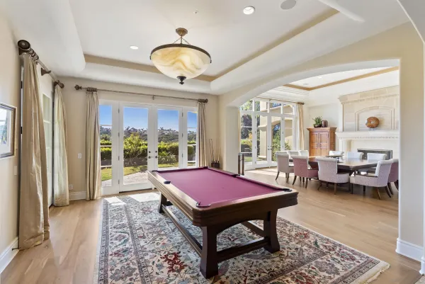 a living room with furniture and a rug