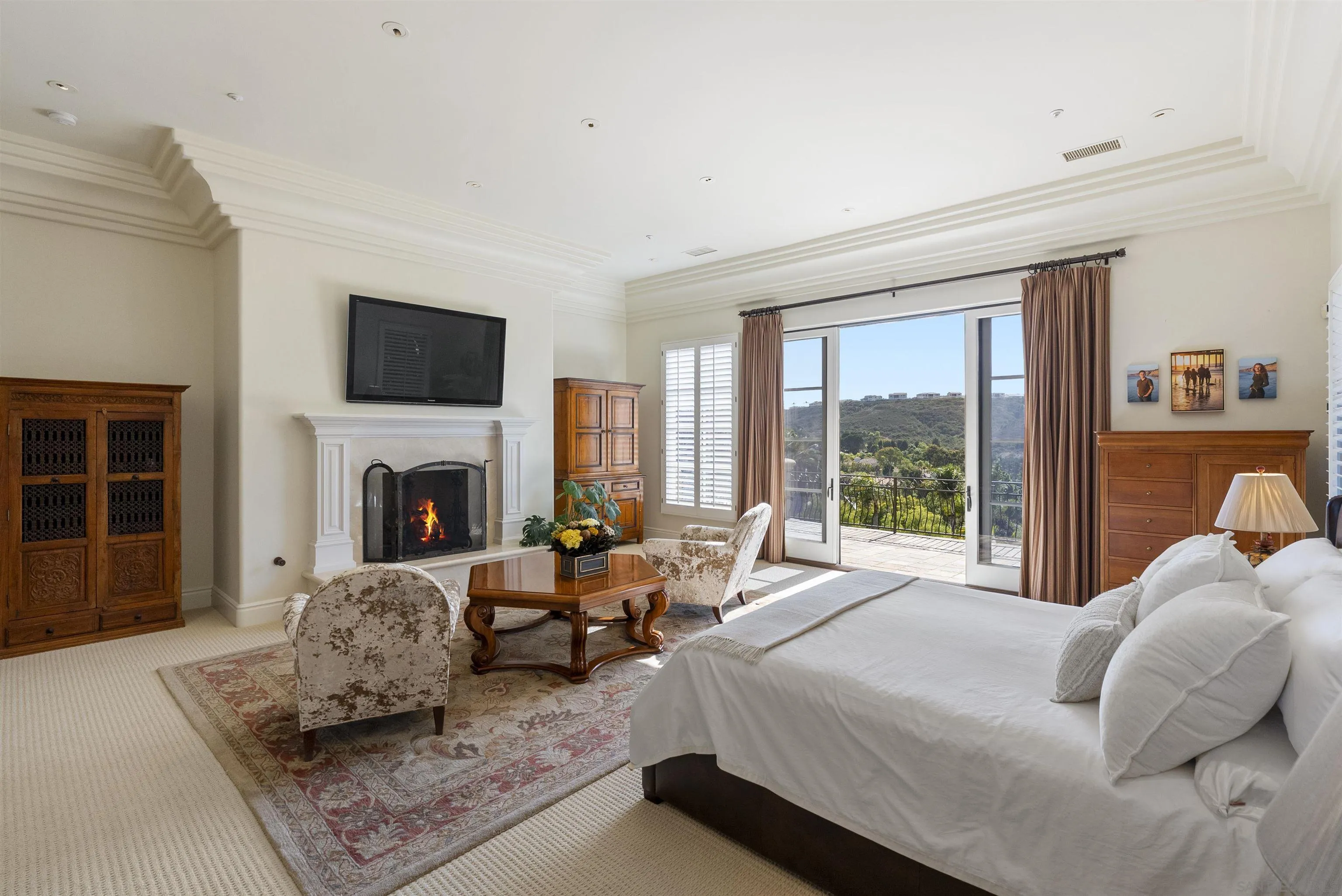 14480 Bellvista Drive Rancho Santa Fe, CA 92067 - Photo 17 of 28 a living room with furniture large window and a fireplace