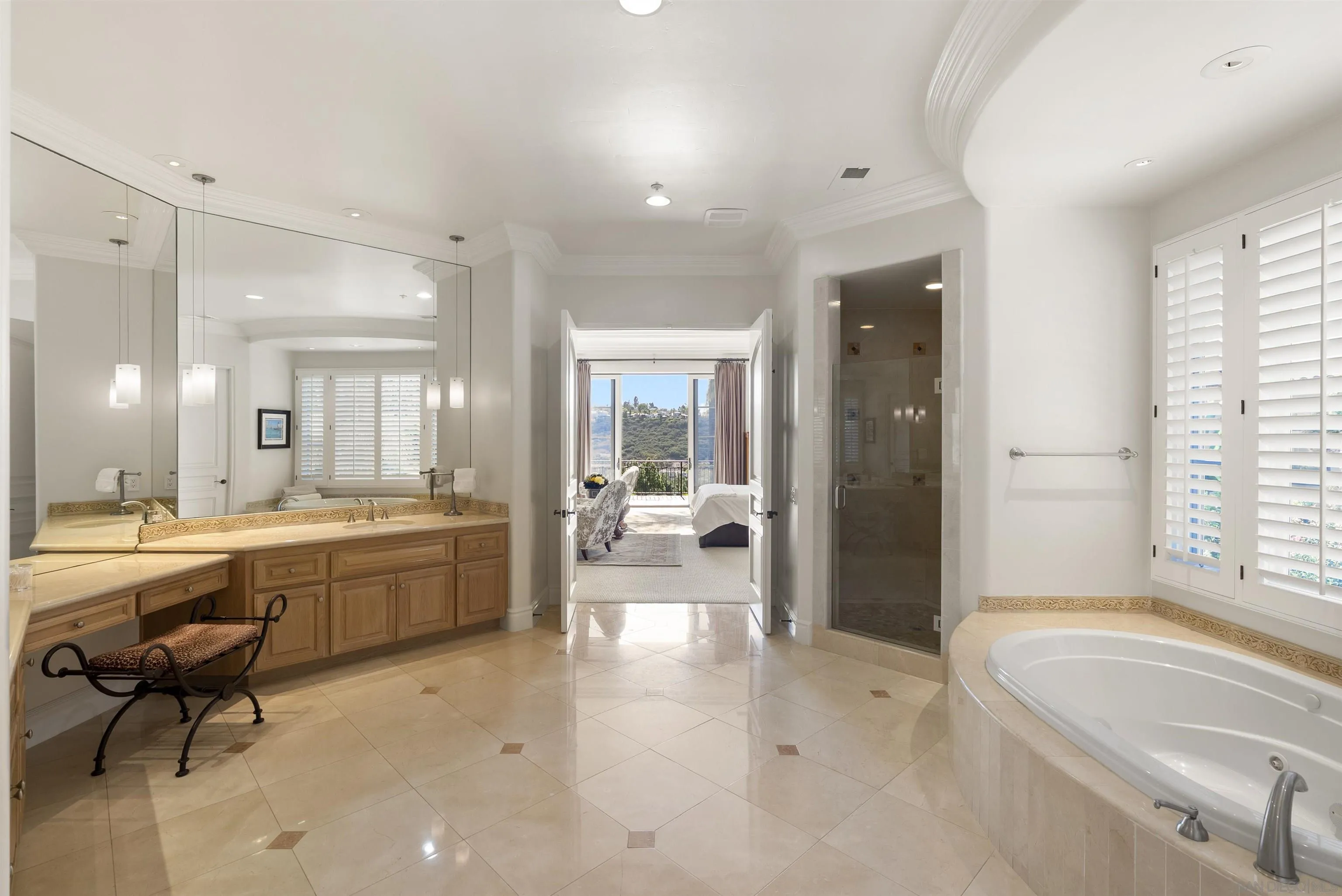 14480 Bellvista Drive Rancho Santa Fe, CA 92067 - Photo 19 of 28 a large spacious bathroom with a large tub and shower