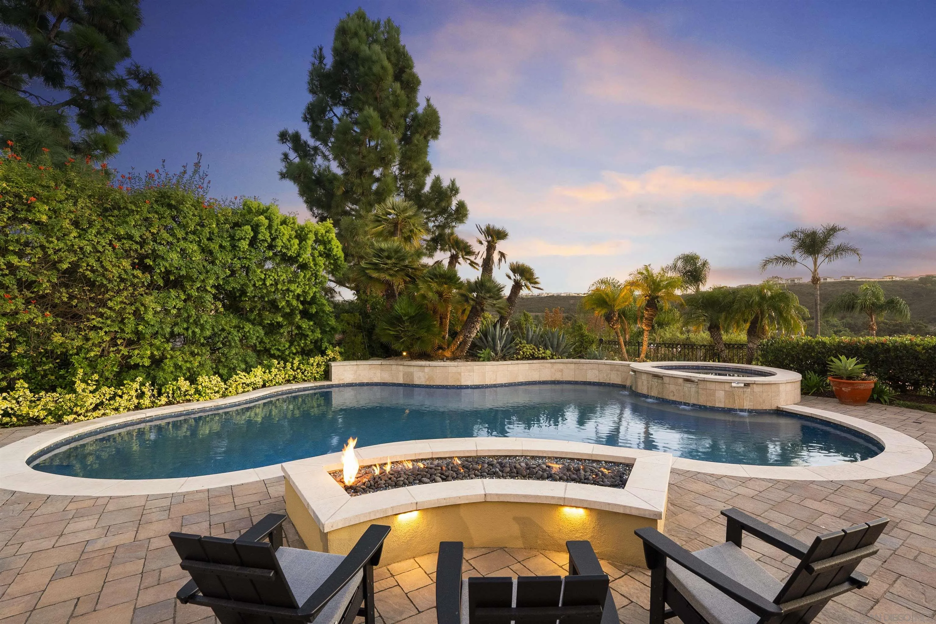 14480 Bellvista Drive Rancho Santa Fe, CA 92067 - Photo 26 of 28 a view of a swimming pool with a patio