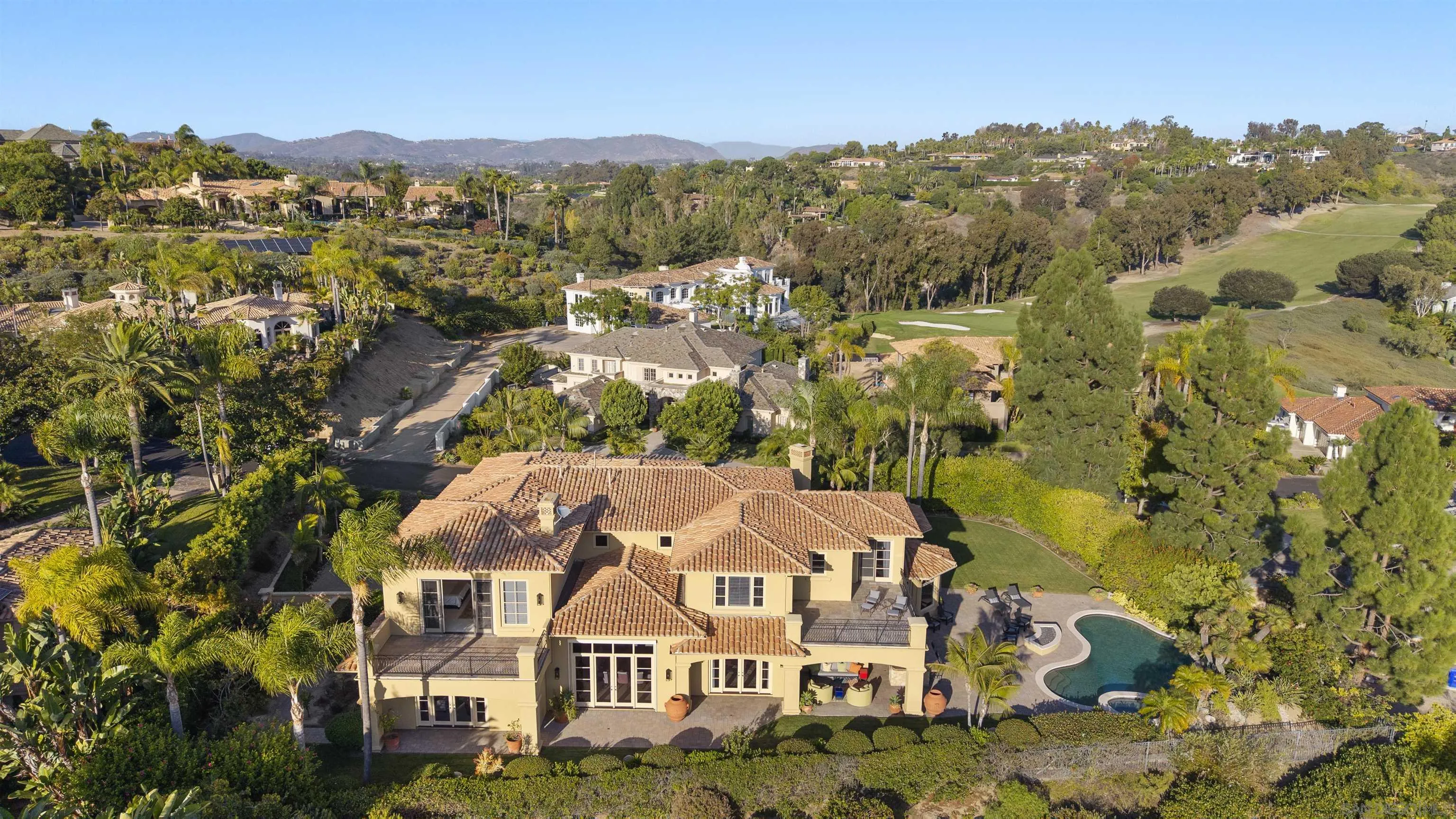 14480 Bellvista Drive Rancho Santa Fe, CA 92067 - Photo 27 of 28 an aerial view of residential houses with outdoor space and trees