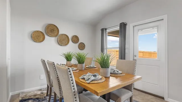 a view of a dining room kitchen counter top space and a living room