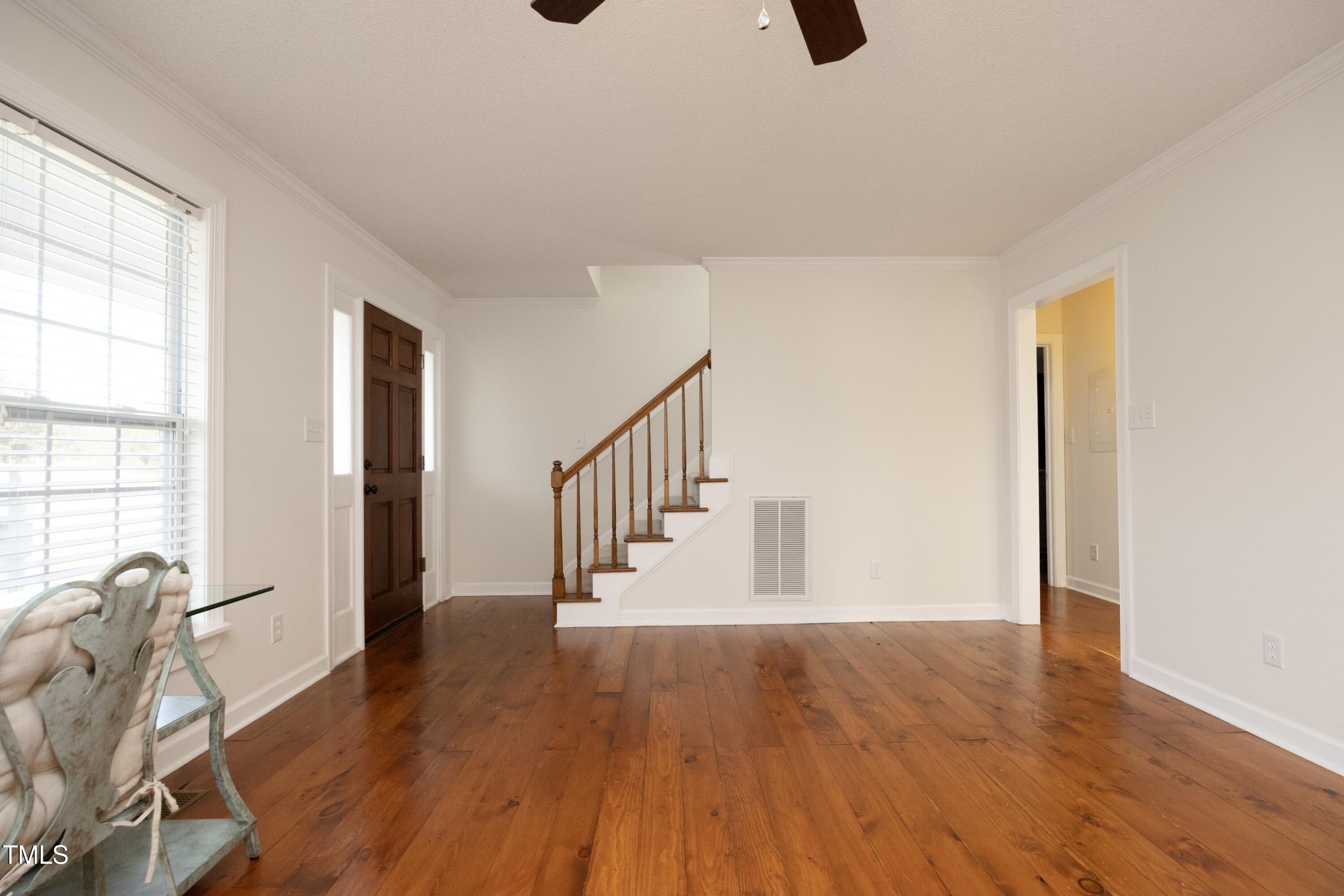 101 Ryans Run Youngsville, NC 27596 - Photo 11 of 33 a view of entryway with wooden floor