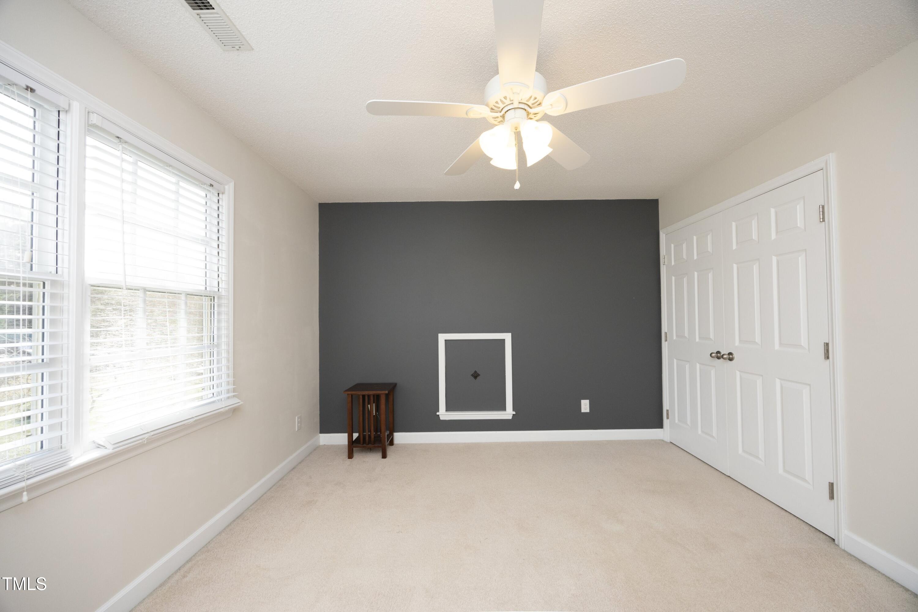 101 Ryans Run Youngsville, NC 27596 - Photo 22 of 33 a view of an empty room with a window
