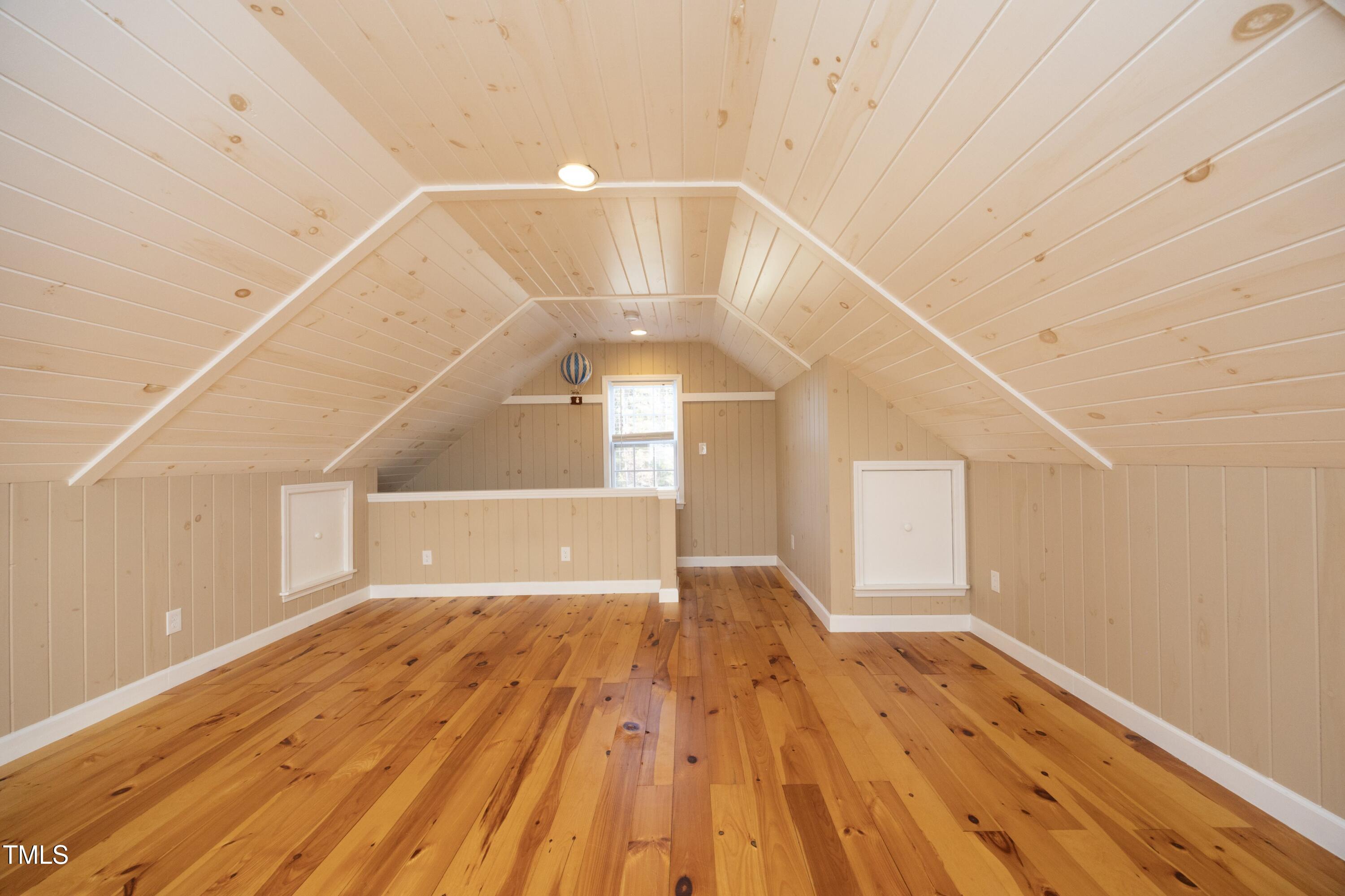 101 Ryans Run Youngsville, NC 27596 - Photo 24 of 33 a view of empty room with wooden floor
