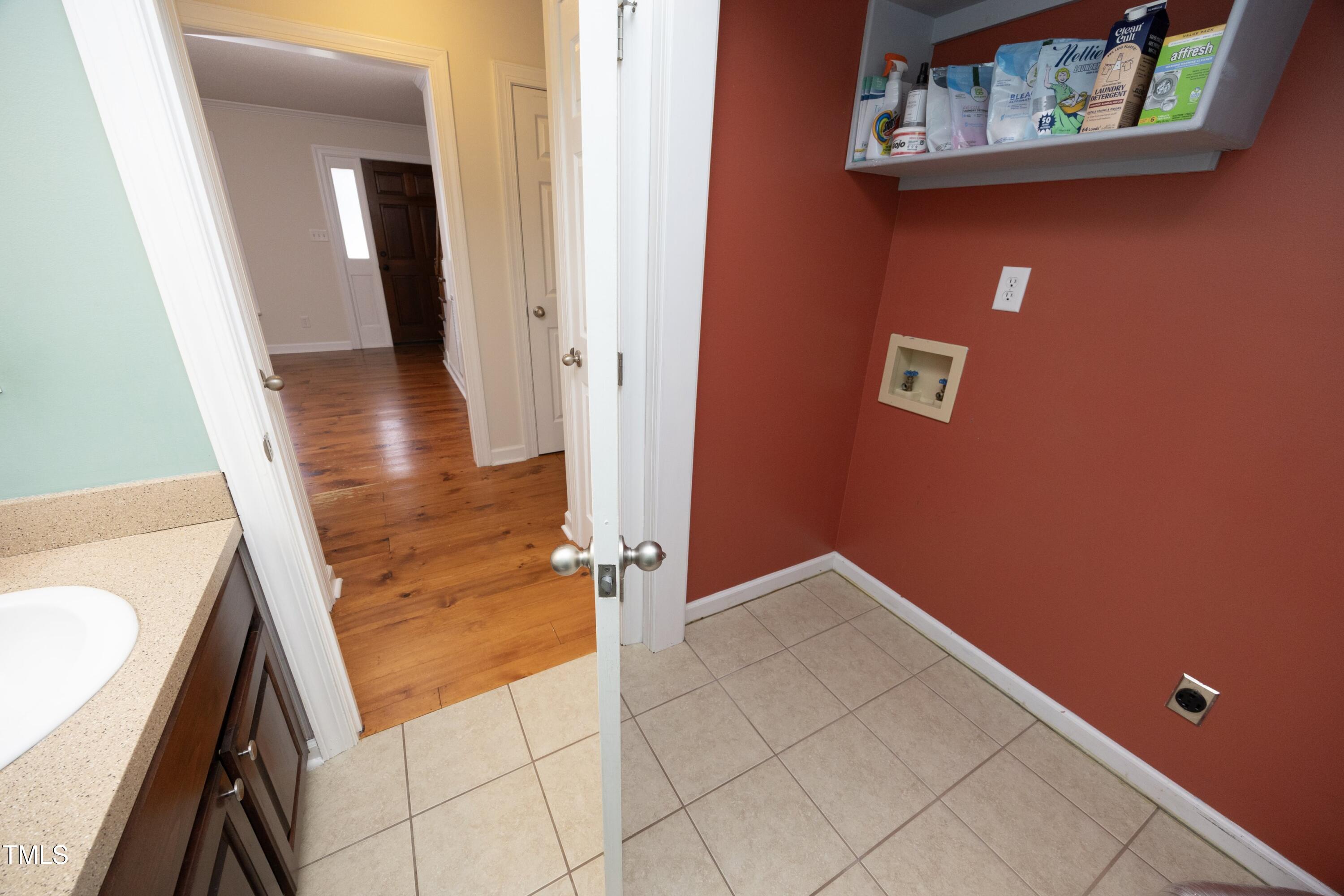 101 Ryans Run Youngsville, NC 27596 - Photo 26 of 33 view of an entryway with wooden floor and cabinet