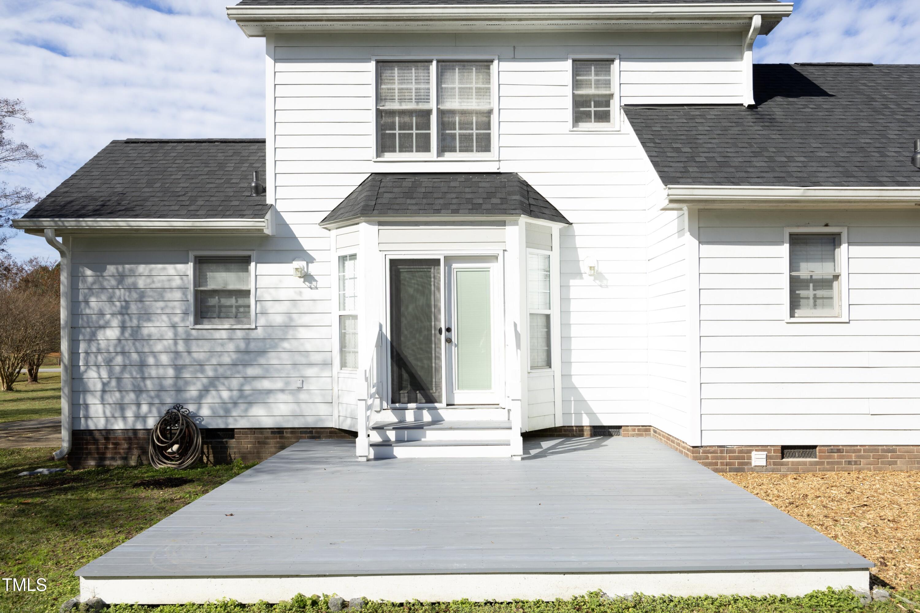 101 Ryans Run Youngsville, NC 27596 - Photo 28 of 33 a front view of a house with a yard