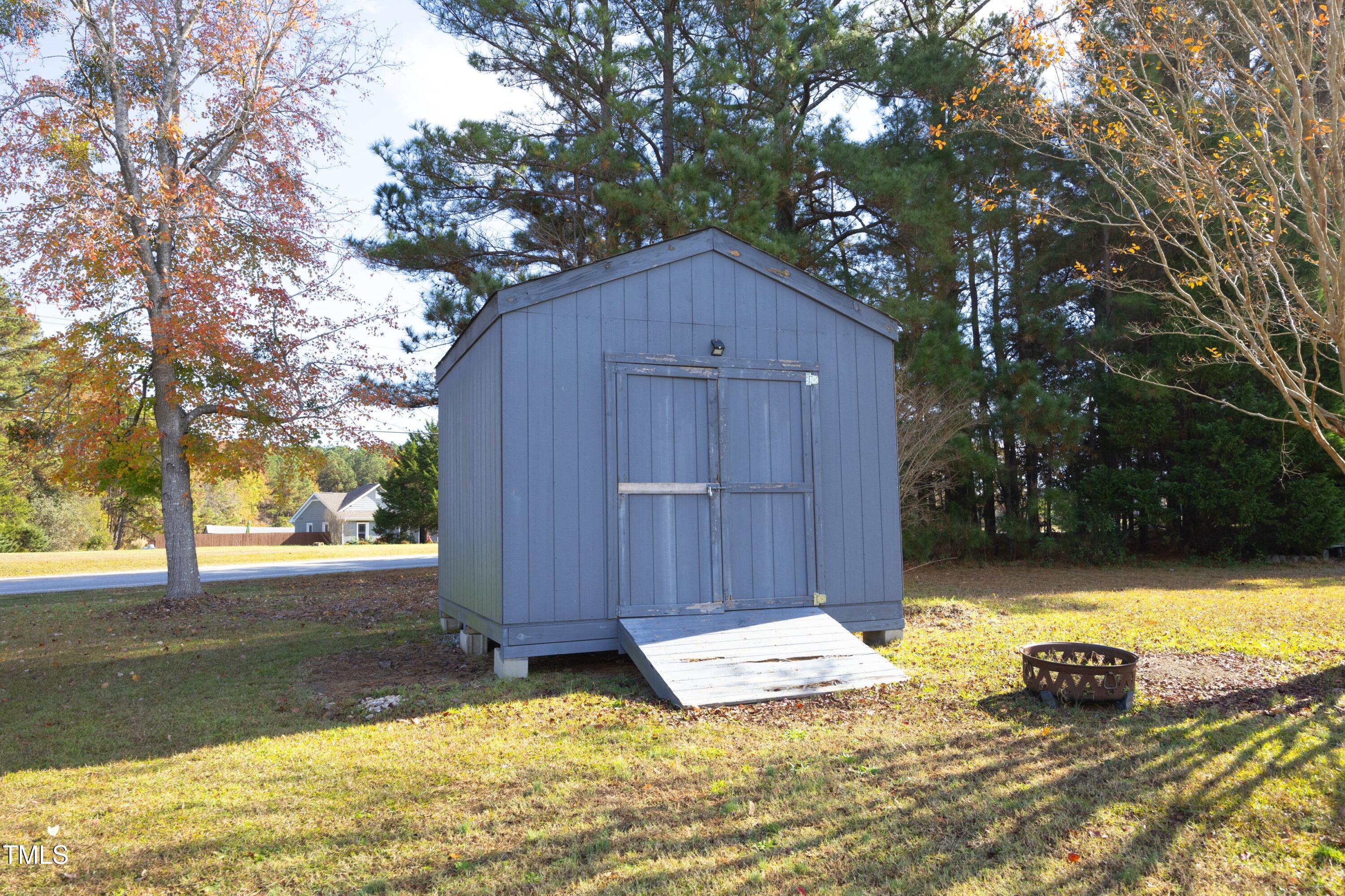 101 Ryans Run Youngsville, NC 27596 - Photo 30 of 33 a view of a backyard of the house