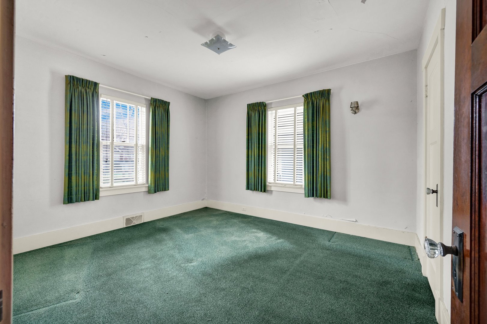 2319 5th Street Peru, IL 61354 - Photo 12 of 37 a view of an empty room with window and stairs