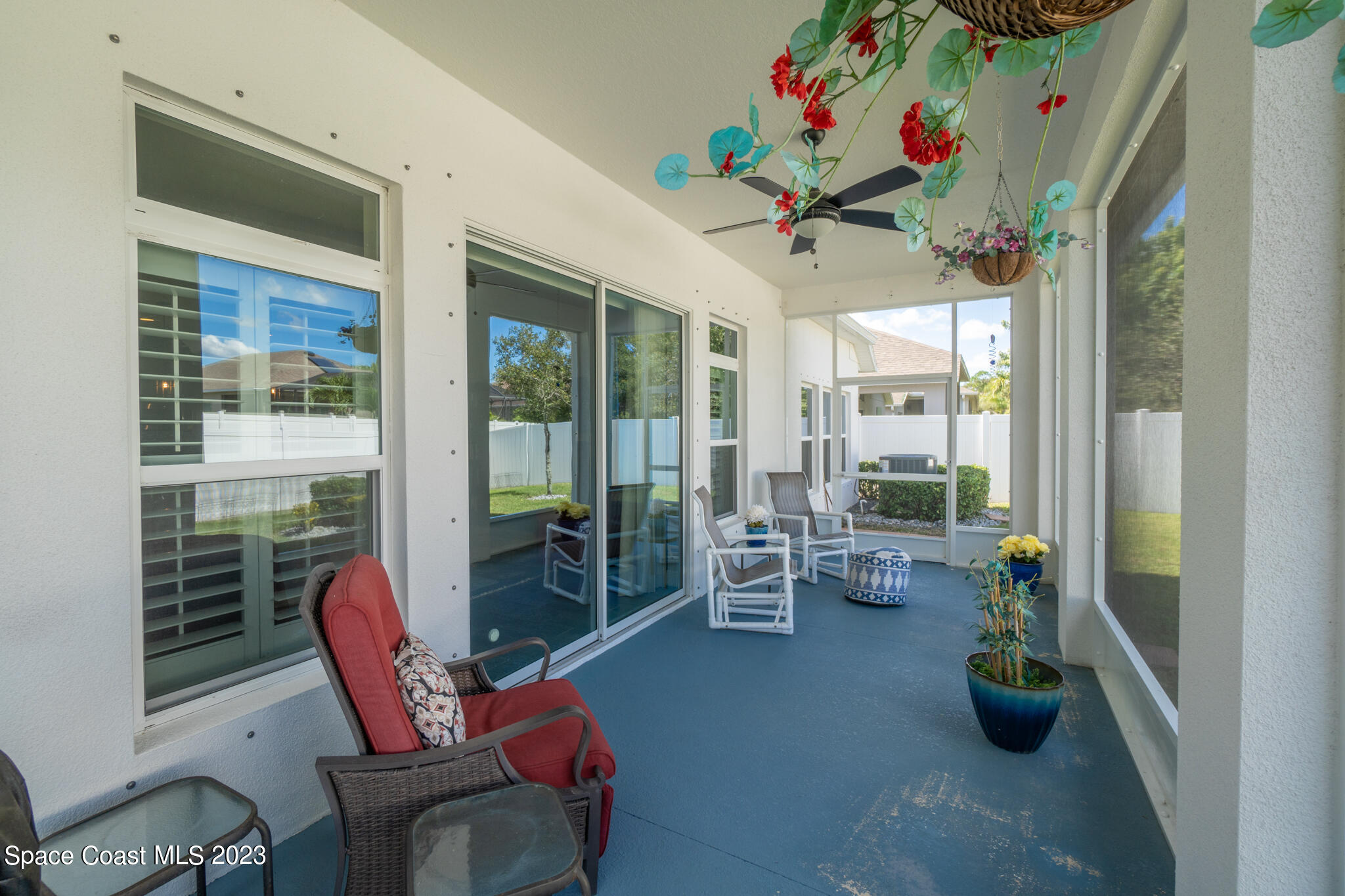 4302 Ruthann Circle Melbourne, FL 32934 - Photo 20 of 45 a dining room with furniture garden view and a potted plant