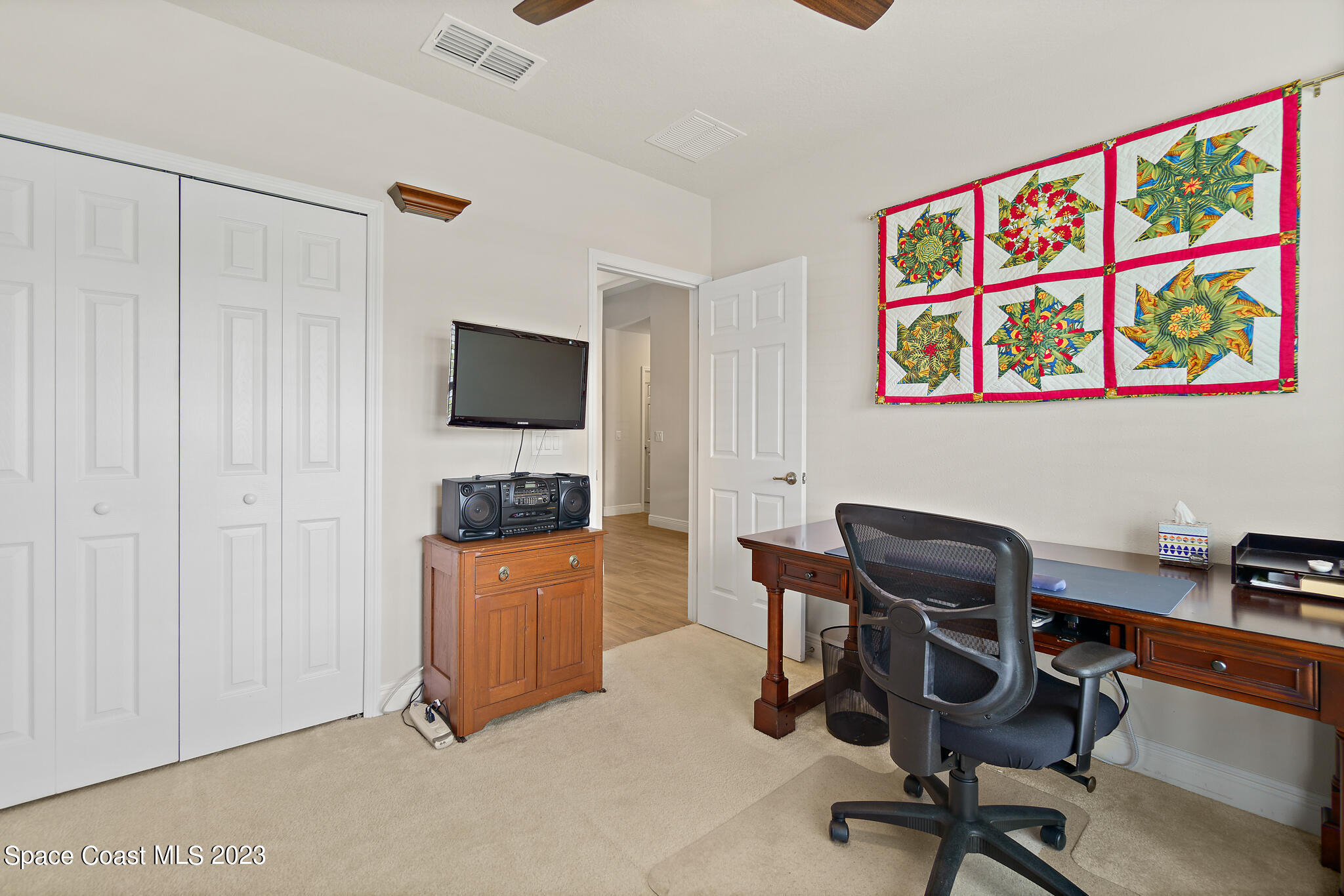 4302 Ruthann Circle Melbourne, FL 32934 - Photo 31 of 45 a view of a workspace with furniture and a window