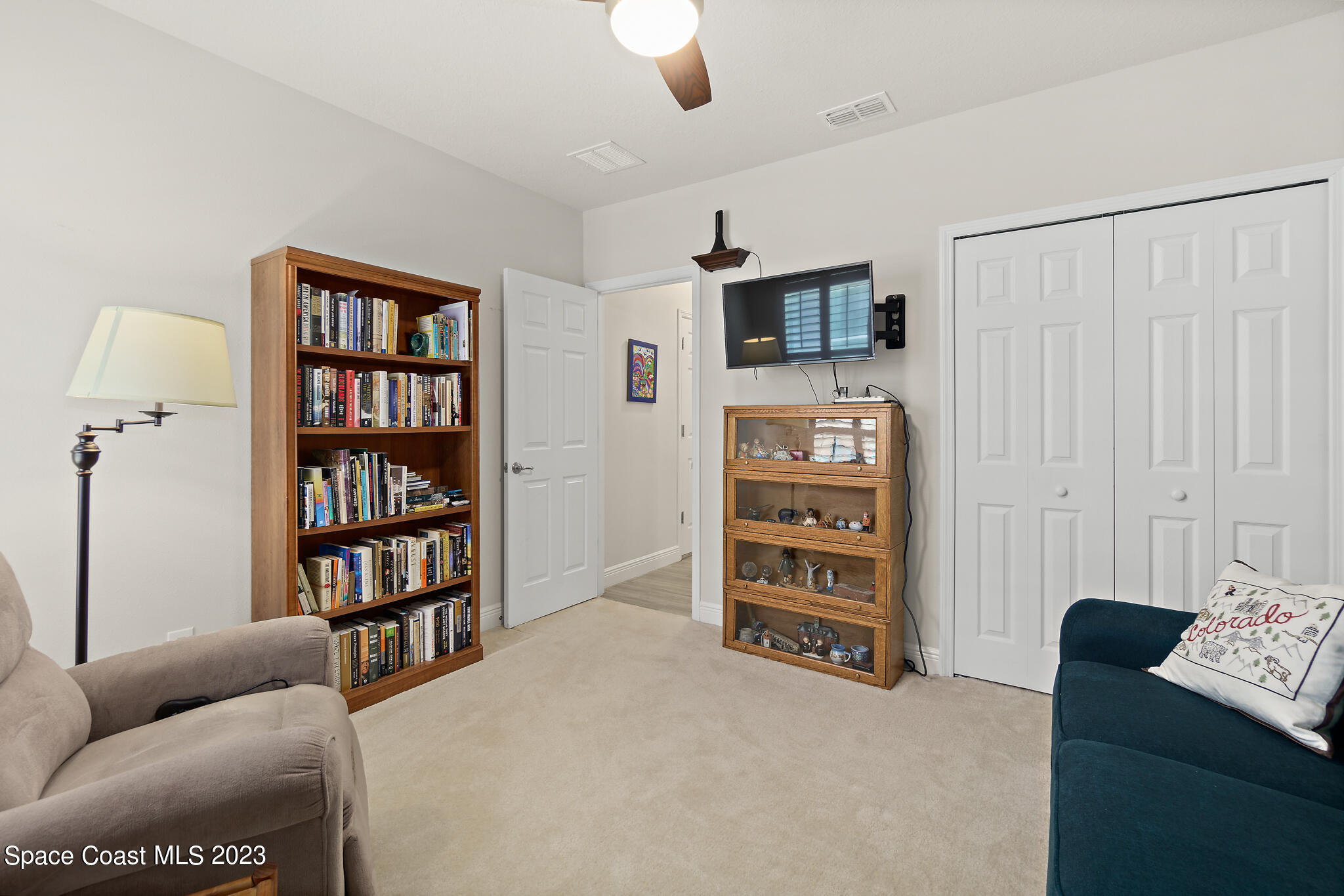 4302 Ruthann Circle Melbourne, FL 32934 - Photo 37 of 45 a view of a livingroom with furniture and cabinet