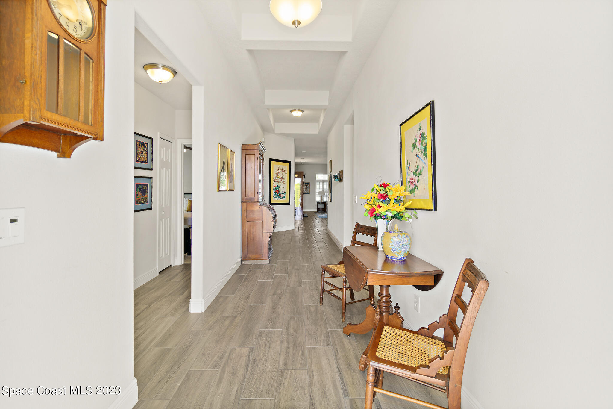 4302 Ruthann Circle Melbourne, FL 32934 - Photo 4 of 45 a dining room with furniture and wooden floor