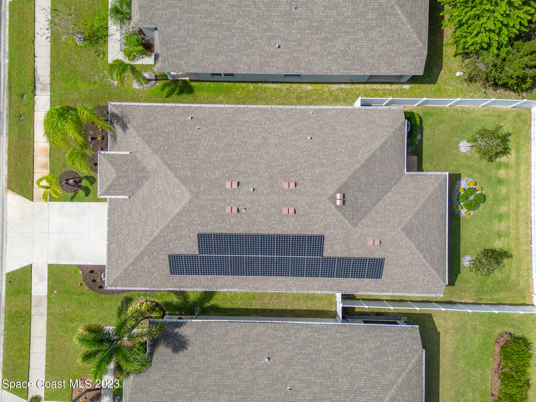 4302 Ruthann Circle Melbourne, FL 32934 - Photo 41 of 45 an aerial view of a house with a swimming pool
