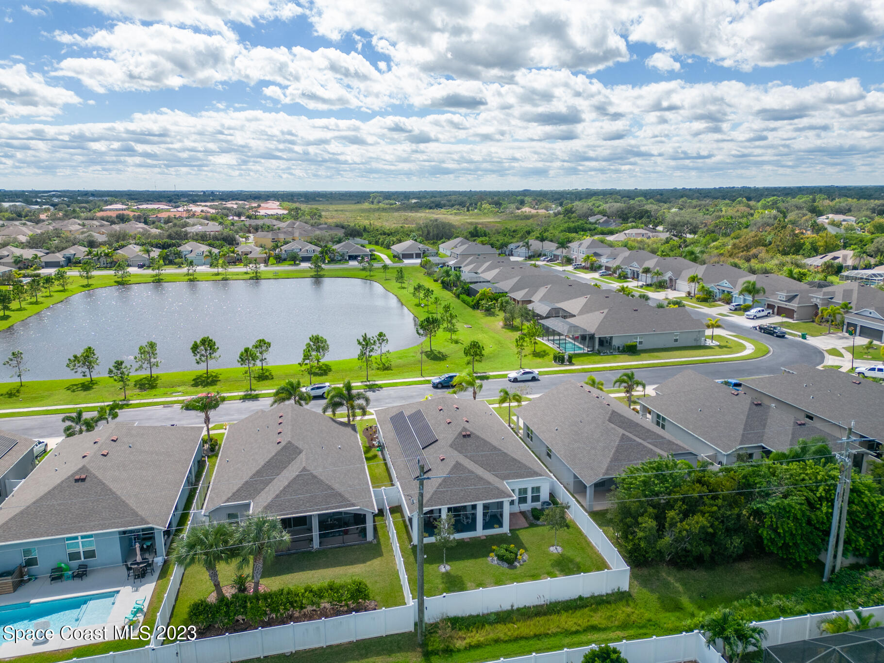 4302 Ruthann Circle Melbourne, FL 32934 - Photo 43 of 45 an aerial view of residential houses with outdoor space and ocean view