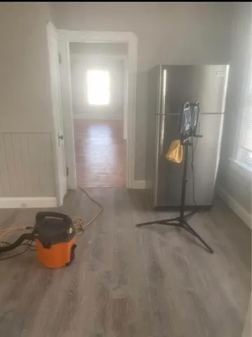 an empty room with window