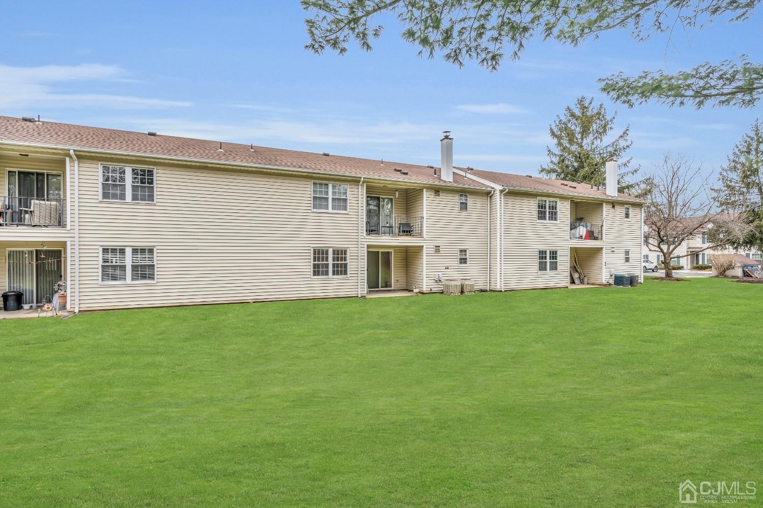 25 Hanover Square Middlesex, NJ 08846 - Photo 14 of 15 a view of a house with a yard