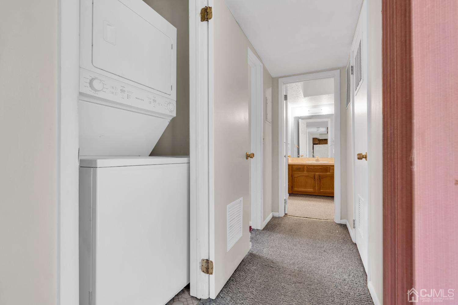 25 Hanover Square Middlesex, NJ 08846 - Photo 7 of 15 a view of a hallway with a livingroom and a bathroom
