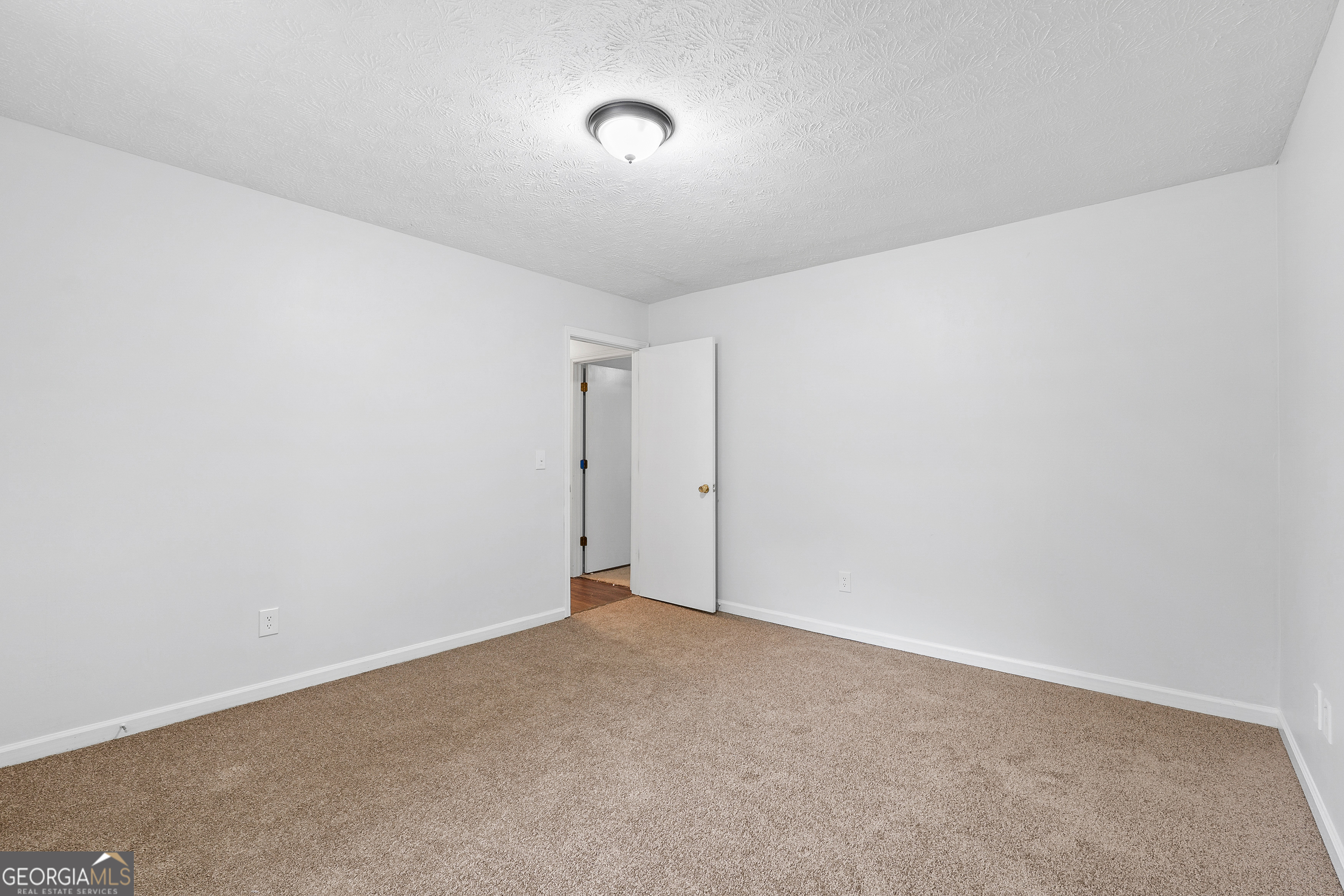 1328 Foxvale Drive Hampton, GA 30228 - Photo 19 of 27 a view of an empty room