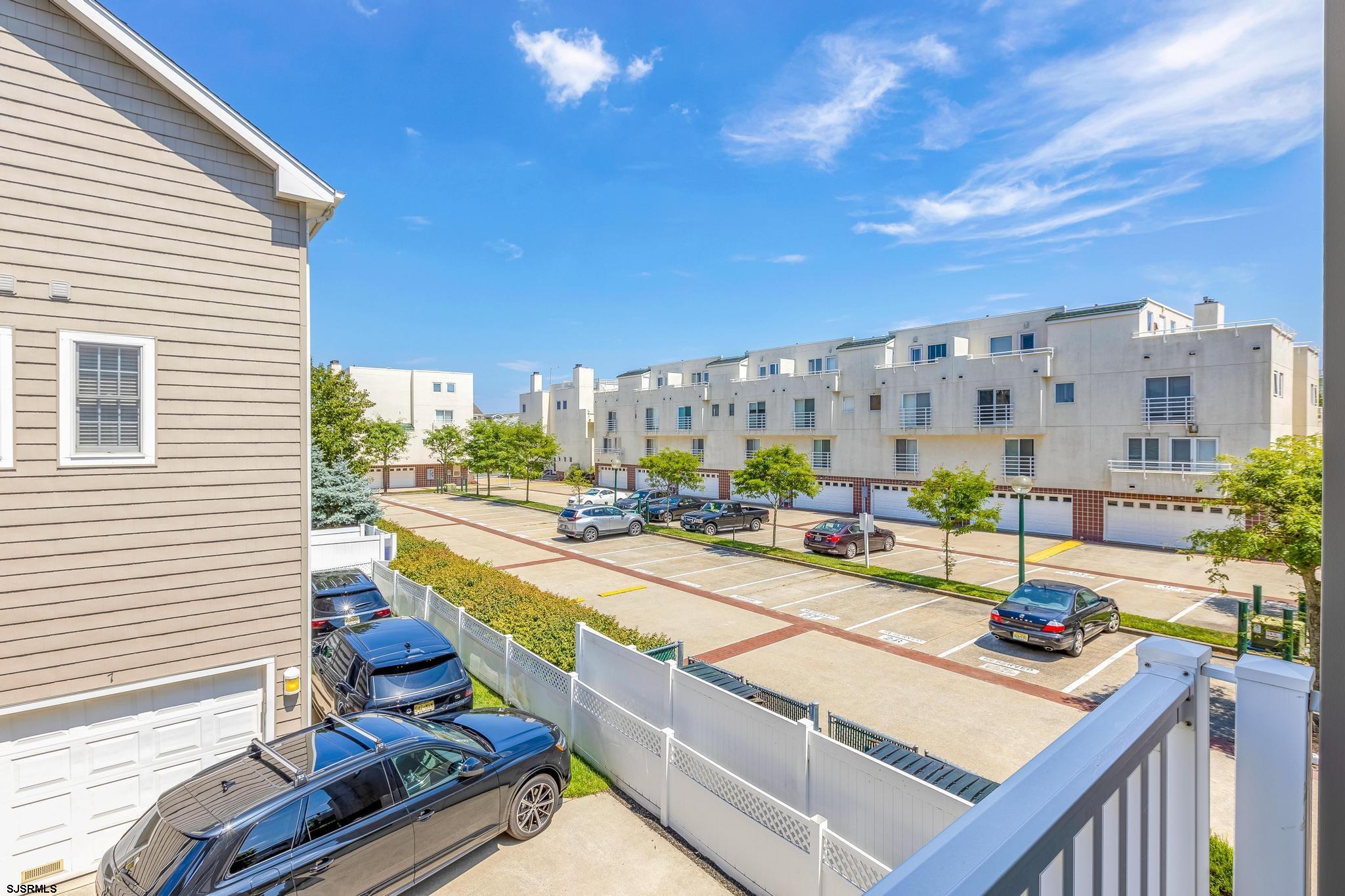 1 South Douglas Avenue, Unit 1 Margate City, NJ 08402 - Photo 31 of 48 a view of a patio with swimming pool