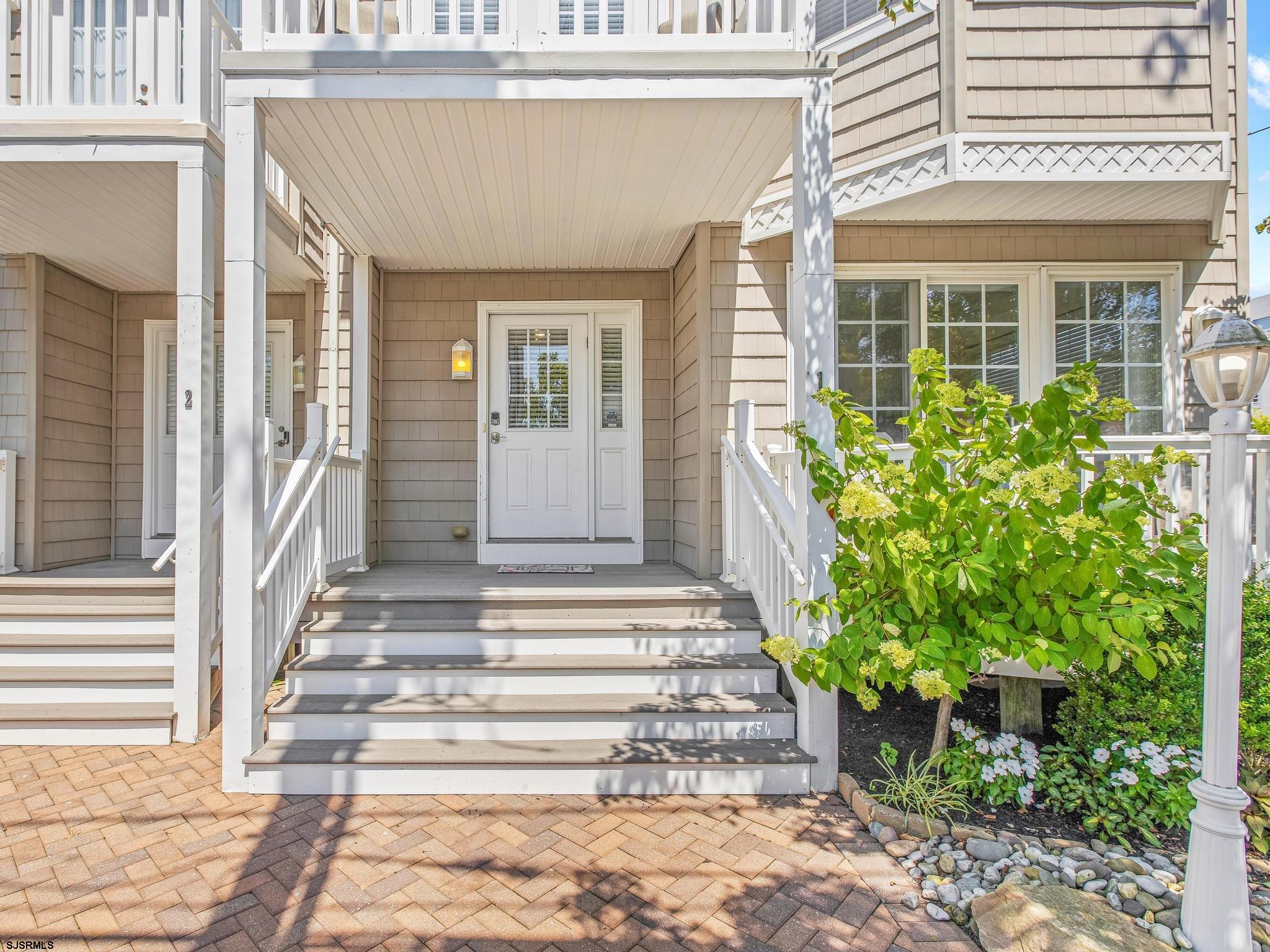 1 South Douglas Avenue, Unit 1 Margate City, NJ 08402 - Photo 6 of 48 a view of a house with a window and a porch