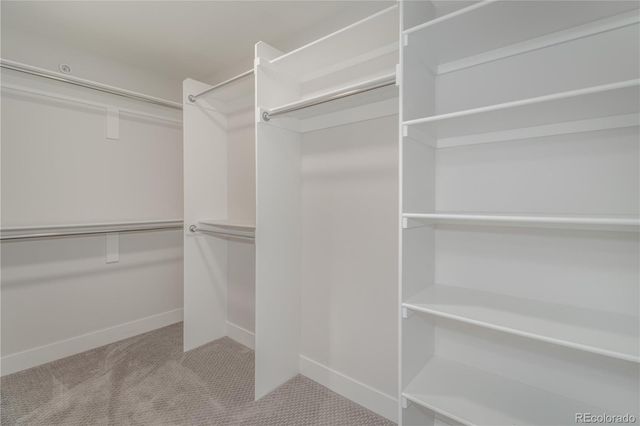 a view of an empty walk in closet