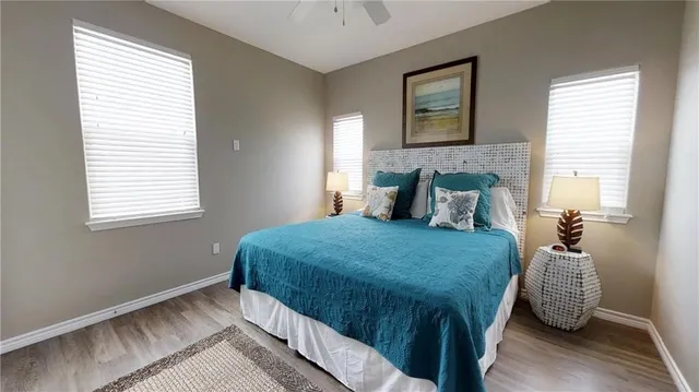 a view of kitchen and sink with wooden floor