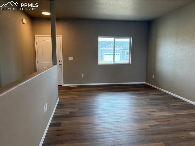 an empty room with windows