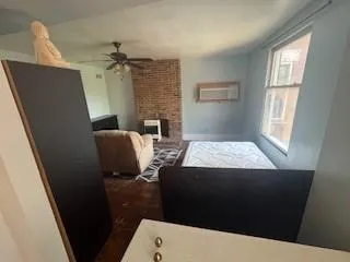 a view of balcony with furniture