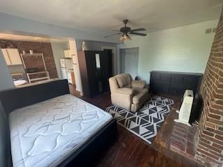 512 Ivy Street, Unit 2 Pittsburgh, PA 15232 - Photo 4 of 6 a bedroom with furniture and wooden floor