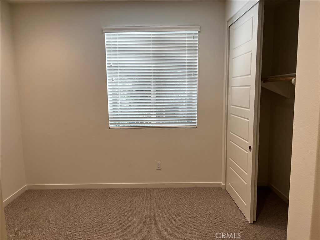 155 Hideaway Loop Mission Viejo, CA 92692 - Photo 16 of 18 an empty room with windows