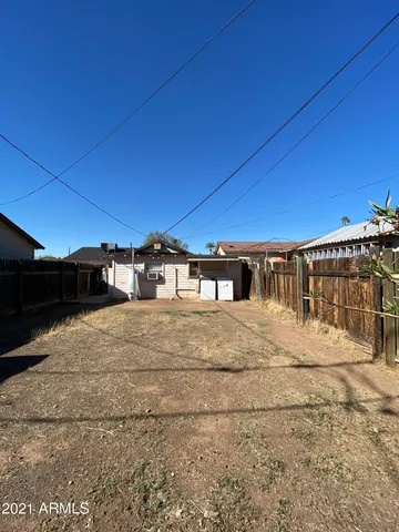 a view of street with big yard
